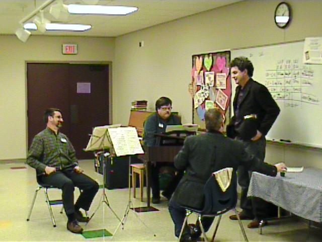 Daniel Bruggen instructs an ensemble. [Dallas Recorder Society workshop and concert with the Amsterdam Loeki Stardust Recorder Quartet - Dallas, TX, Feb. 28-29, 2004]